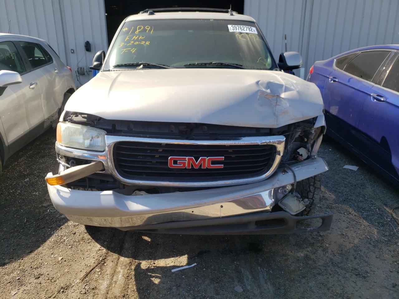 Photo 9 from auction – 2004 GMC YUKON with VIN 1GKEC13Z34J281289