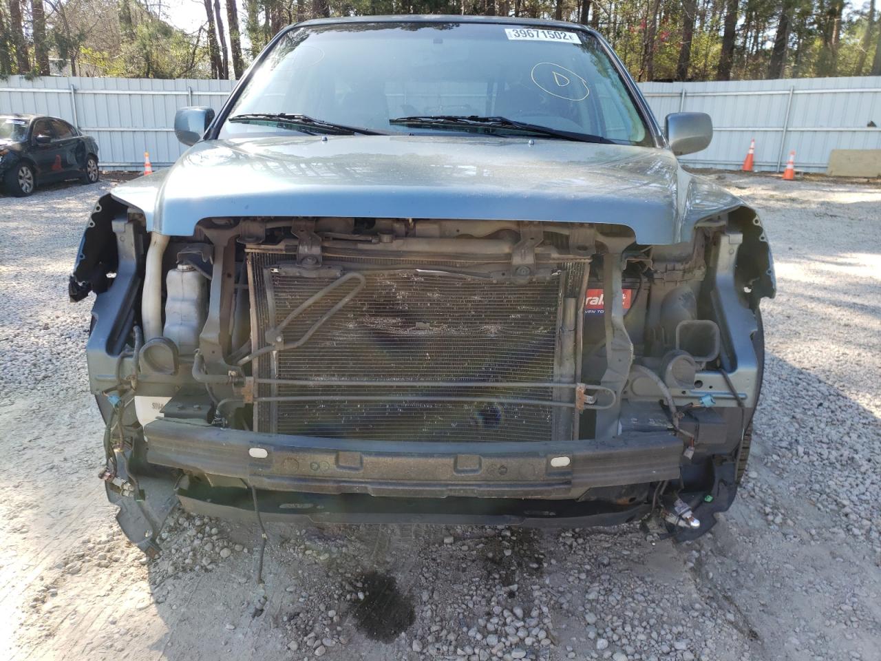 Photo 9 from auction – 2006 HONDA PILOT EX with VIN 5FNYF18646B020102