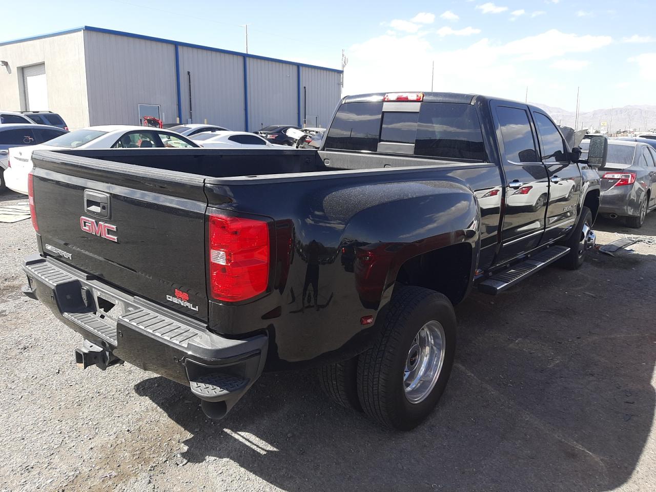 Photo 4 from auction – 2015 GMC SIERRA K35 with VIN 1GT424E82FF144088