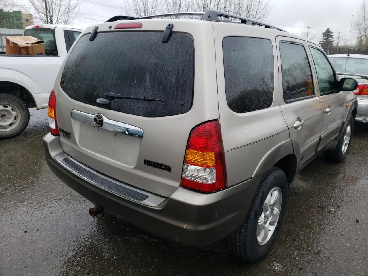 Photo 4 from auction – 2001 MAZDA TRIBUTE LX with VIN 4F2CU08191KM63808