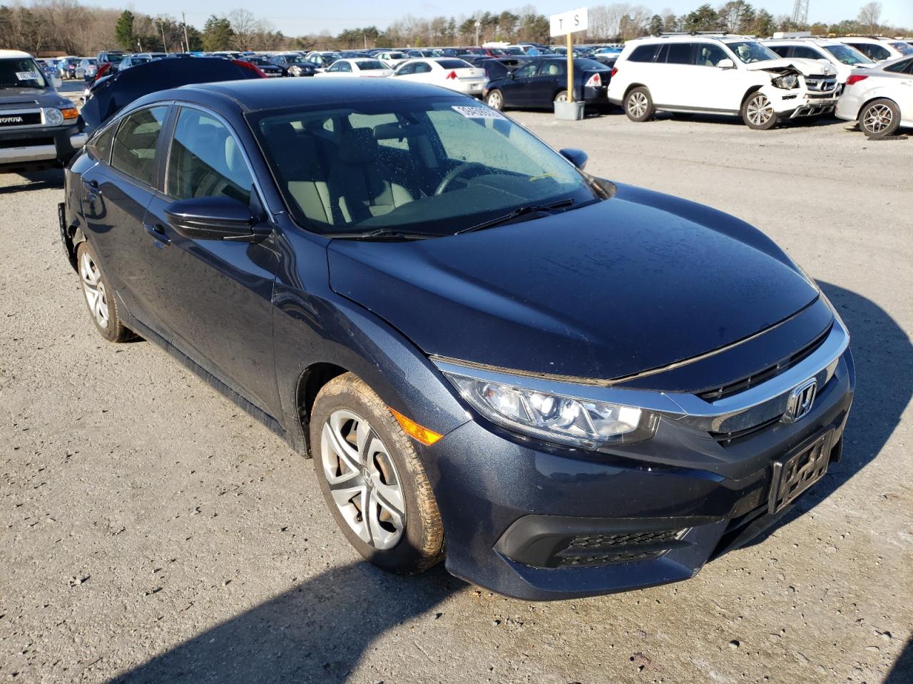 HONDA CIVIC LX 2016 with VIN 19XFC2F5XGE251061 - Photo from auction