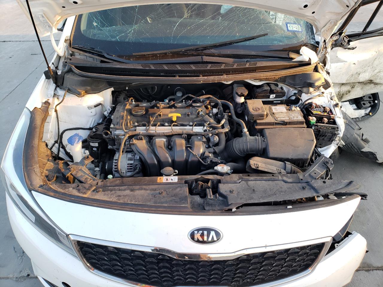 Photo 7 from auction – 2017 KIA FORTE LX with VIN 3KPFL4A79HE014082