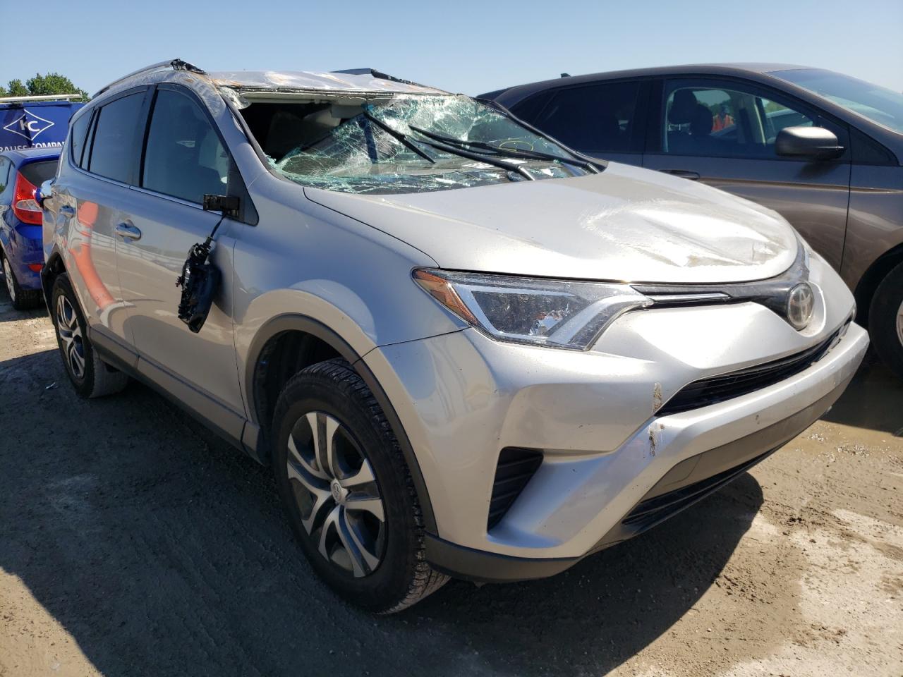 TOYOTA RAV4 LE 2018 with VIN 2T3ZFREV1JW482019 - Photo from auction