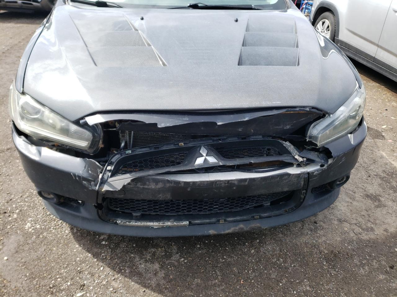 Photo 9 from auction – 2013 MITSUBISHI LANCER SE with VIN JA32V2FW9DU604712