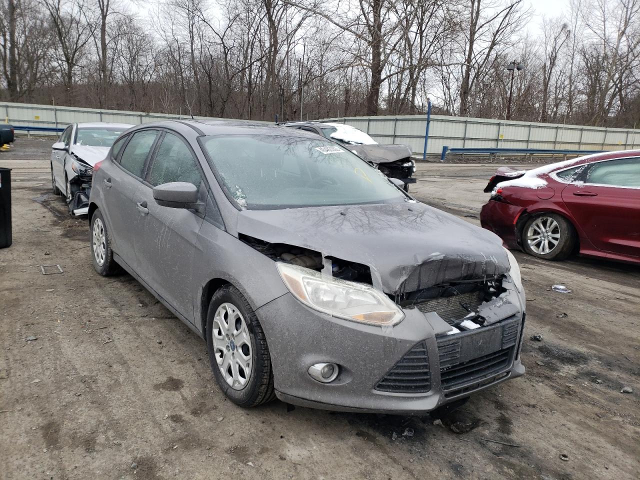 FORD FOCUS SE 2012 with VIN 1FAHP3K2XCL138877 - Photo from auction