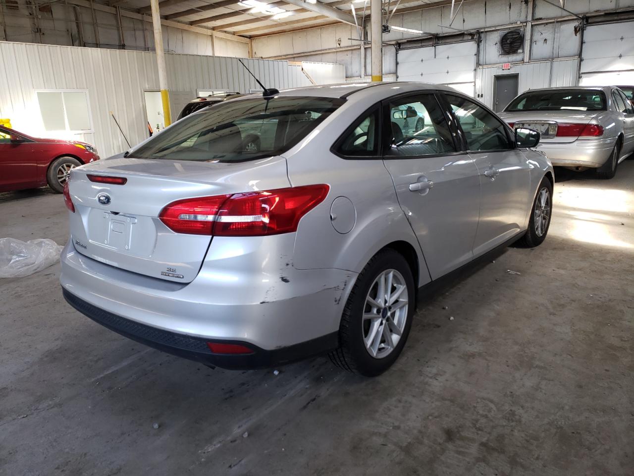 Photo 4 from auction – 2016 FORD FOCUS SE with VIN 1FADP3F24GL356618