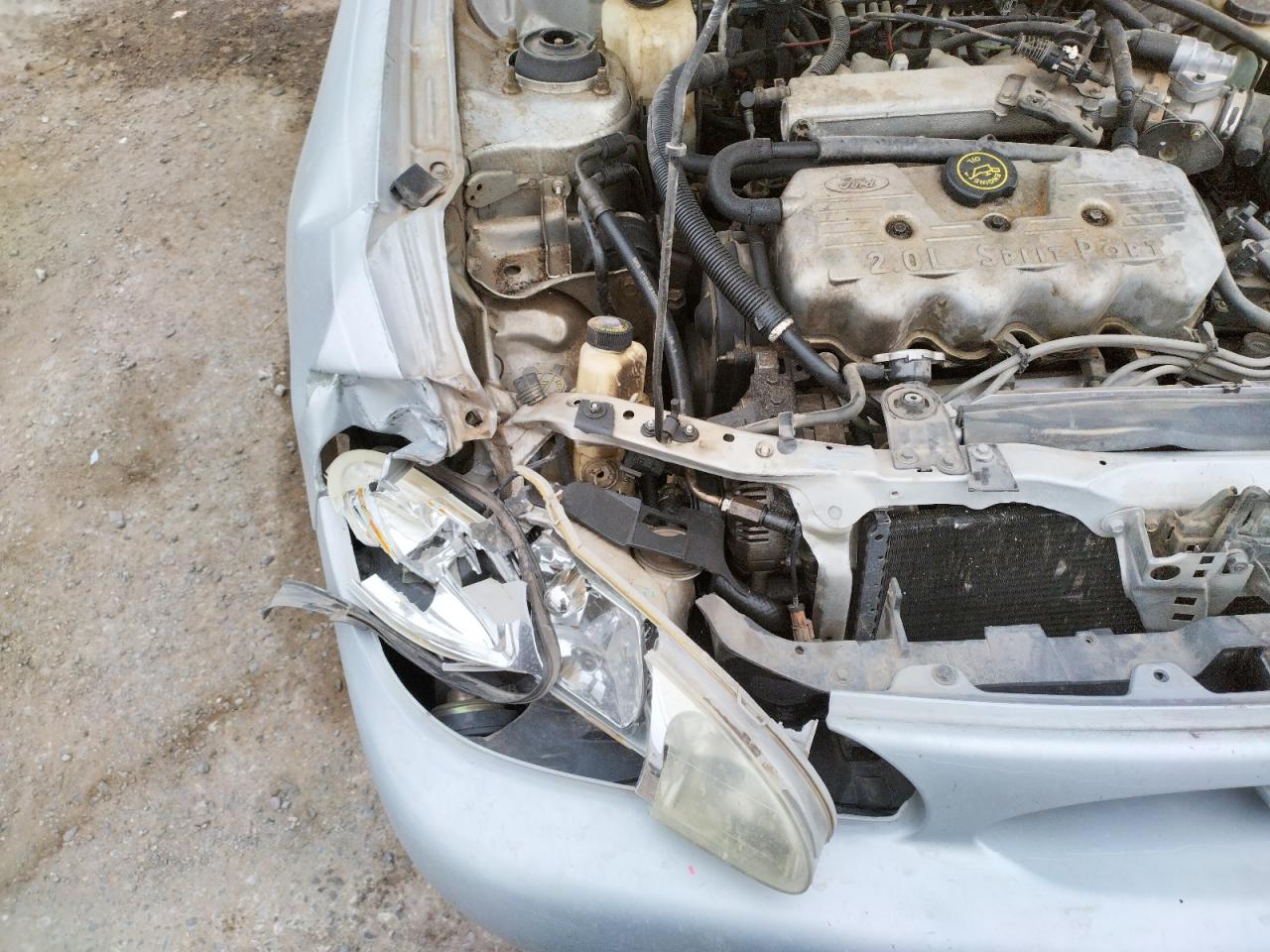 Photo 9 from auction – 2000 FORD ESCORT with VIN 3FAFP13P7YR182009