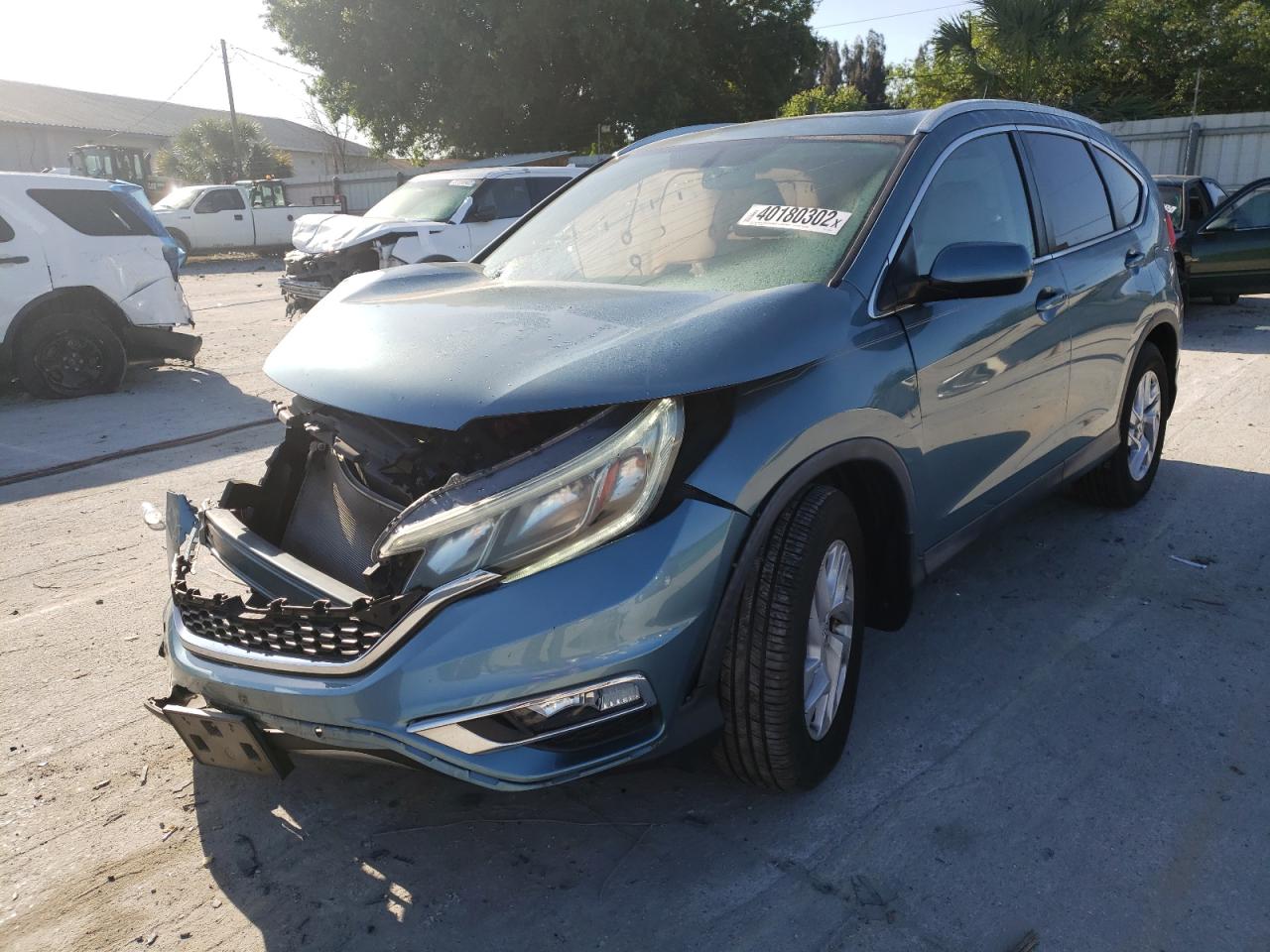 Photo 2 from auction – 2015 HONDA CR-V EXL with VIN 2HKRM3H71FH500856