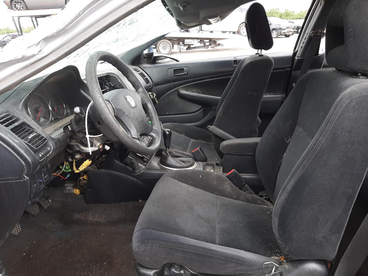 Photo 5 from auction – 2003 HONDA CIVIC LX with VIN 1HGEM215X3L025220