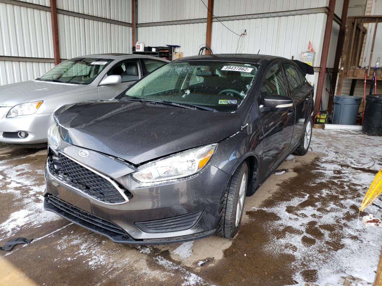 Photo 2 from auction – 2015 FORD FOCUS SE with VIN 1FADP3F24FL344628