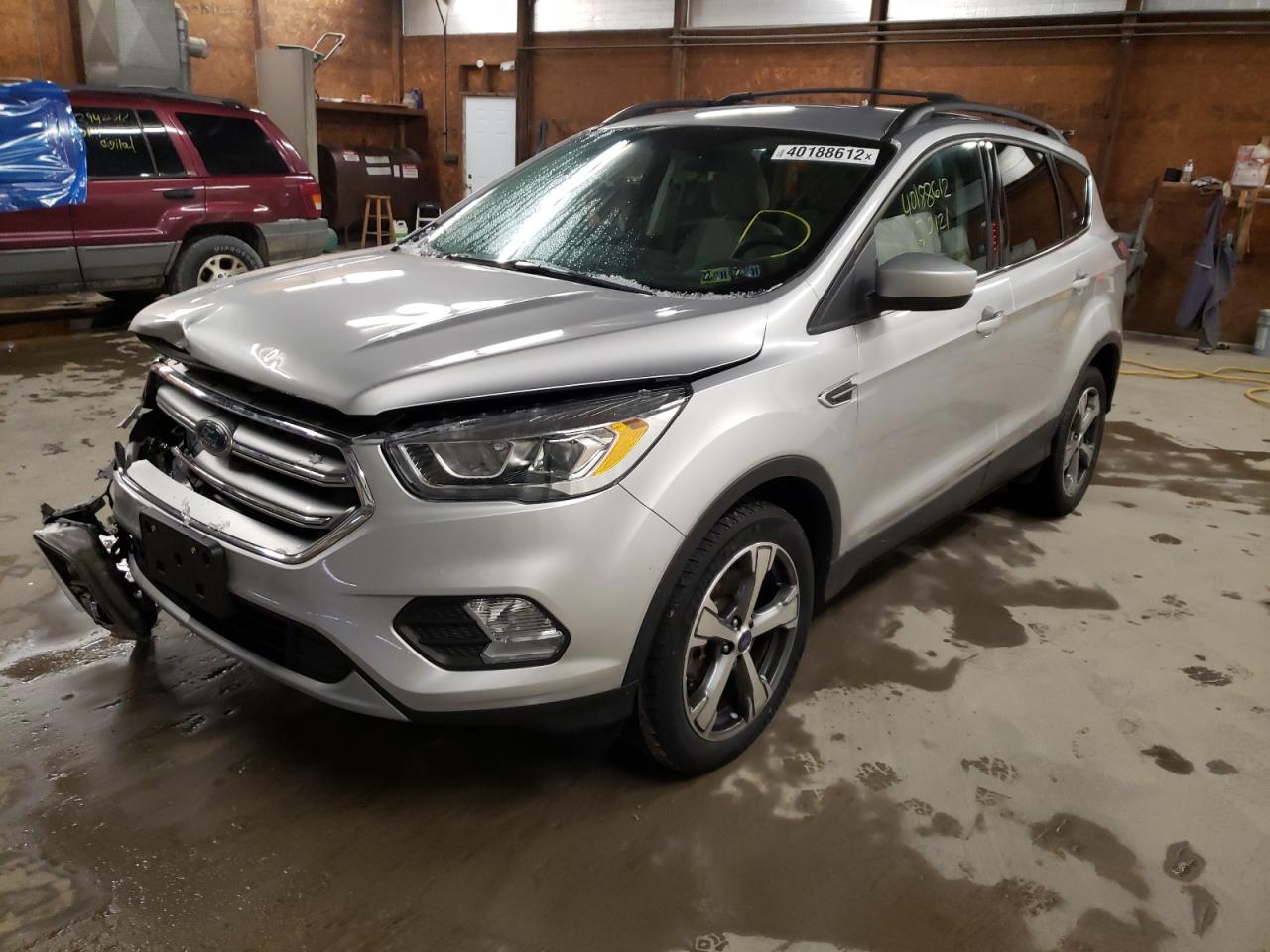 Photo 2 from auction – 2017 FORD ESCAPE SE with VIN 1FMCU9GDXHUA57241