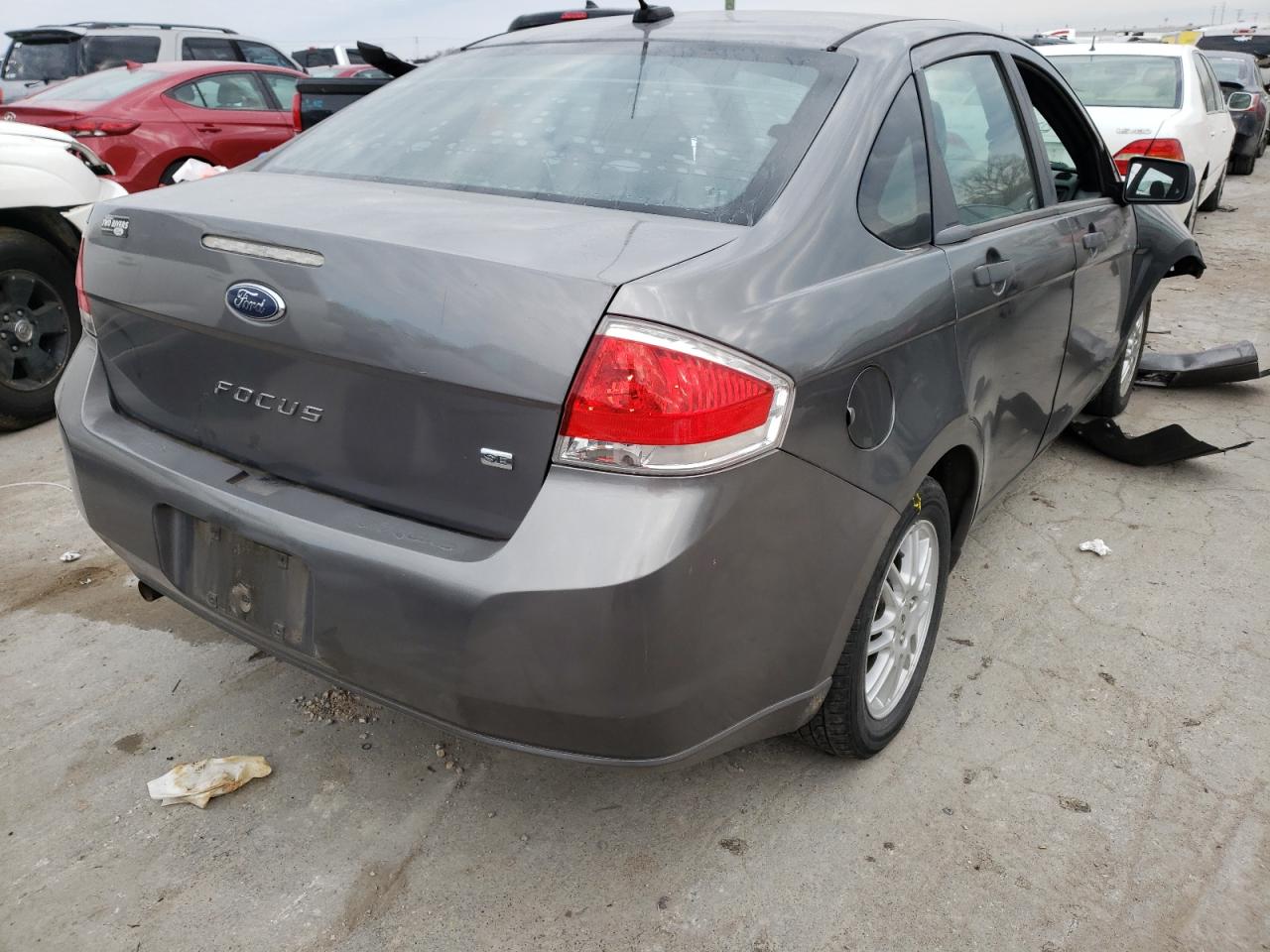 Photo 4 from auction – 2011 FORD FOCUS SE with VIN 1FAHP3FNXBW100910