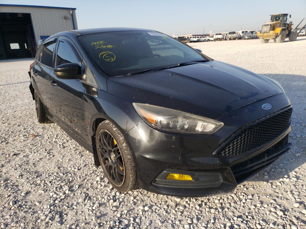FORD FOCUS ST 2015 with VIN 1FADP3L92FL220410 - Photo from auction