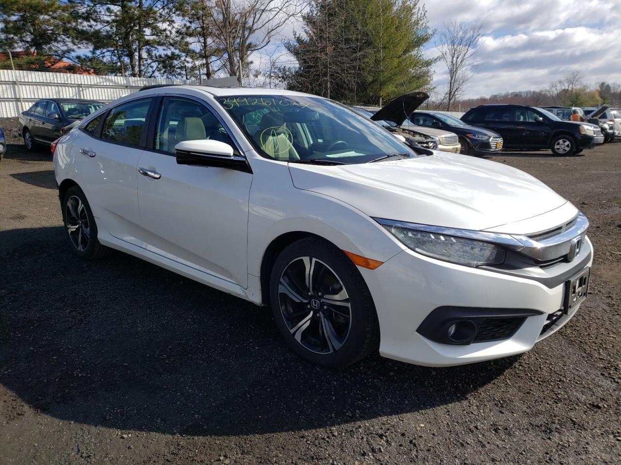 HONDA CIVIC TOUR 2016 with VIN 19XFC1F91GE211108 - Photo from auction
