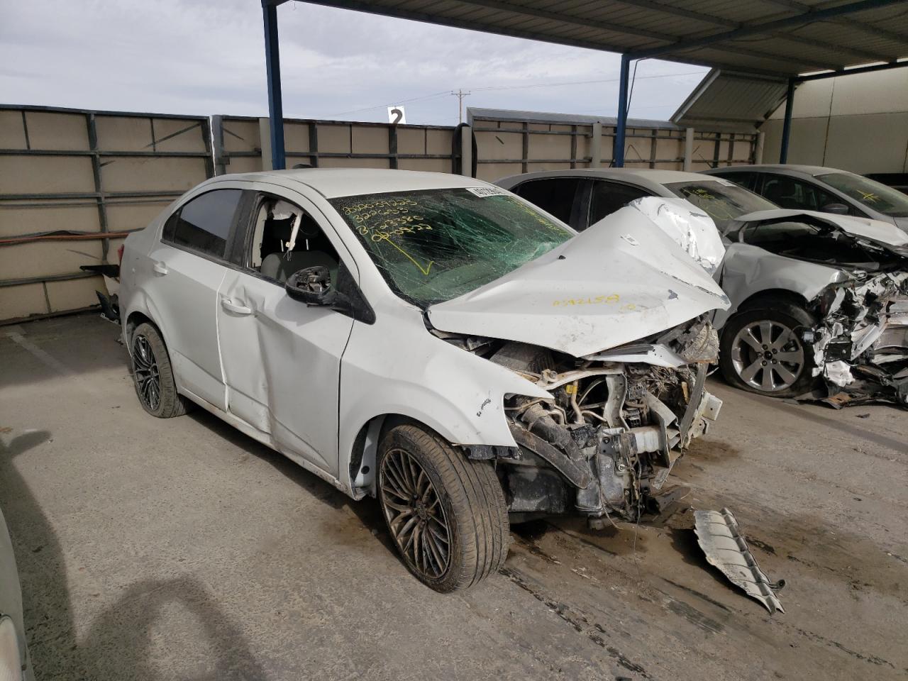 CHEVROLET SONIC LS 2017 with VIN 1G1JB5SH7H4104299 - Photo from auction