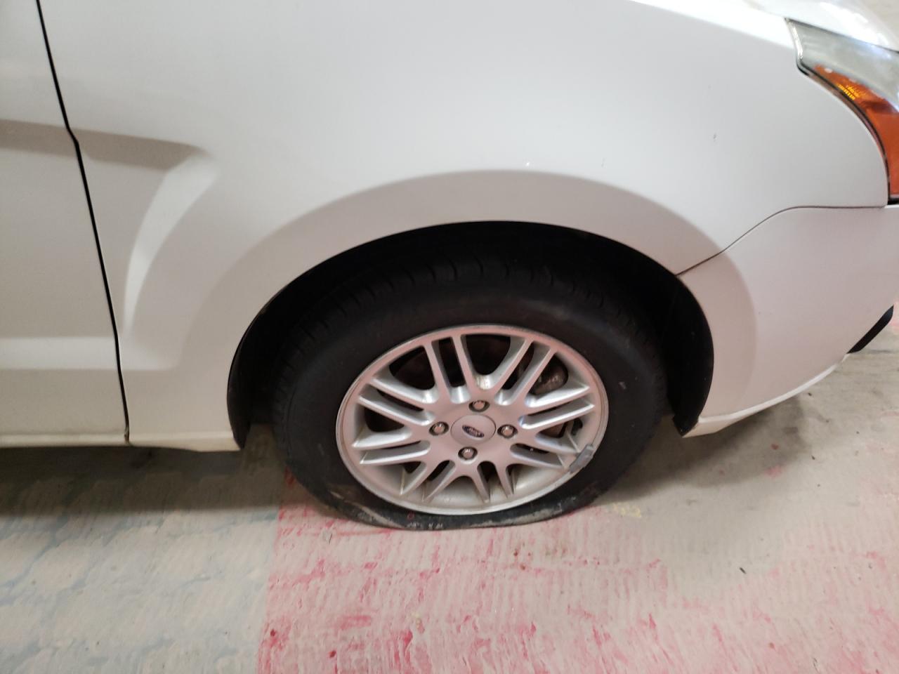 Photo 9 from auction – 2009 FORD FOCUS SE with VIN 1FAHP35N69W249813