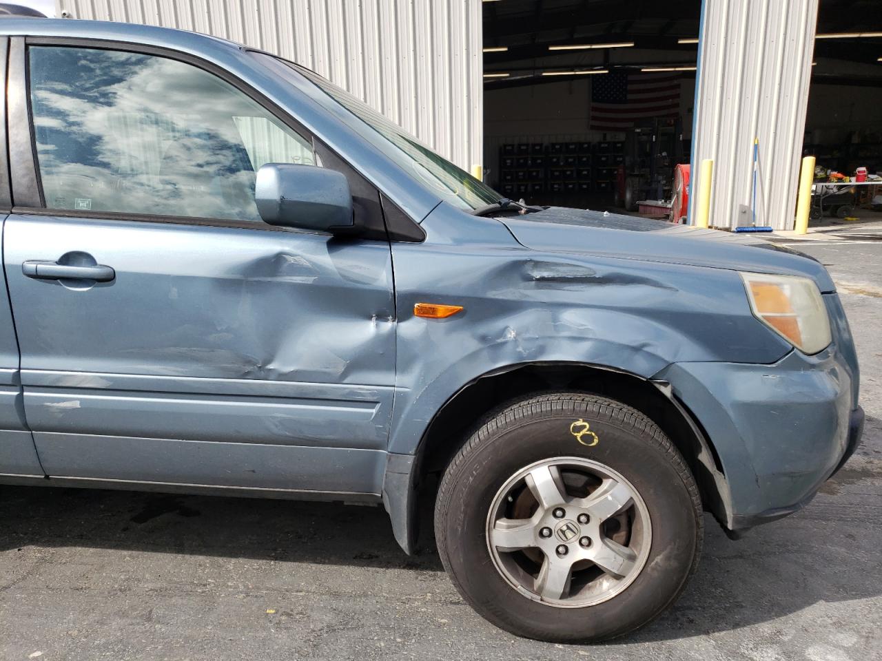 Photo 9 from auction – 2006 HONDA PILOT EX with VIN 2HKYF18616H530490