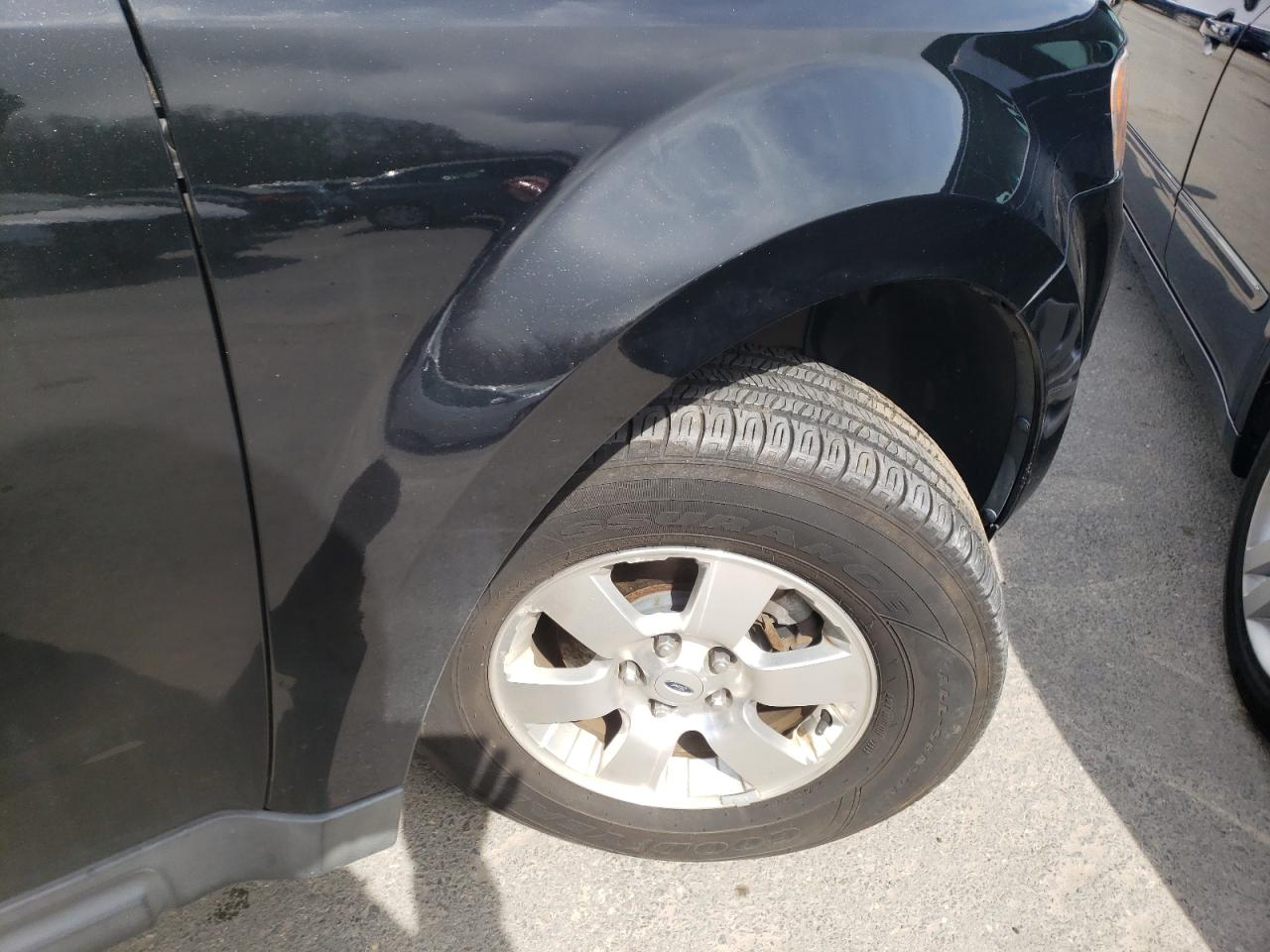 Photo 9 from auction – 2011 FORD ESCAPE LIM with VIN 1FMCU0EG3BKB88300