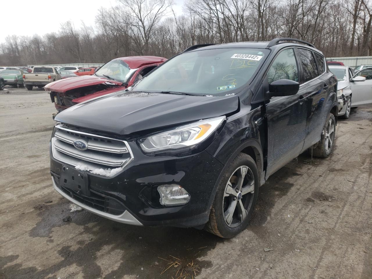 Photo 2 from auction – 2017 FORD ESCAPE SE with VIN 1FMCU0GD7HUC62947