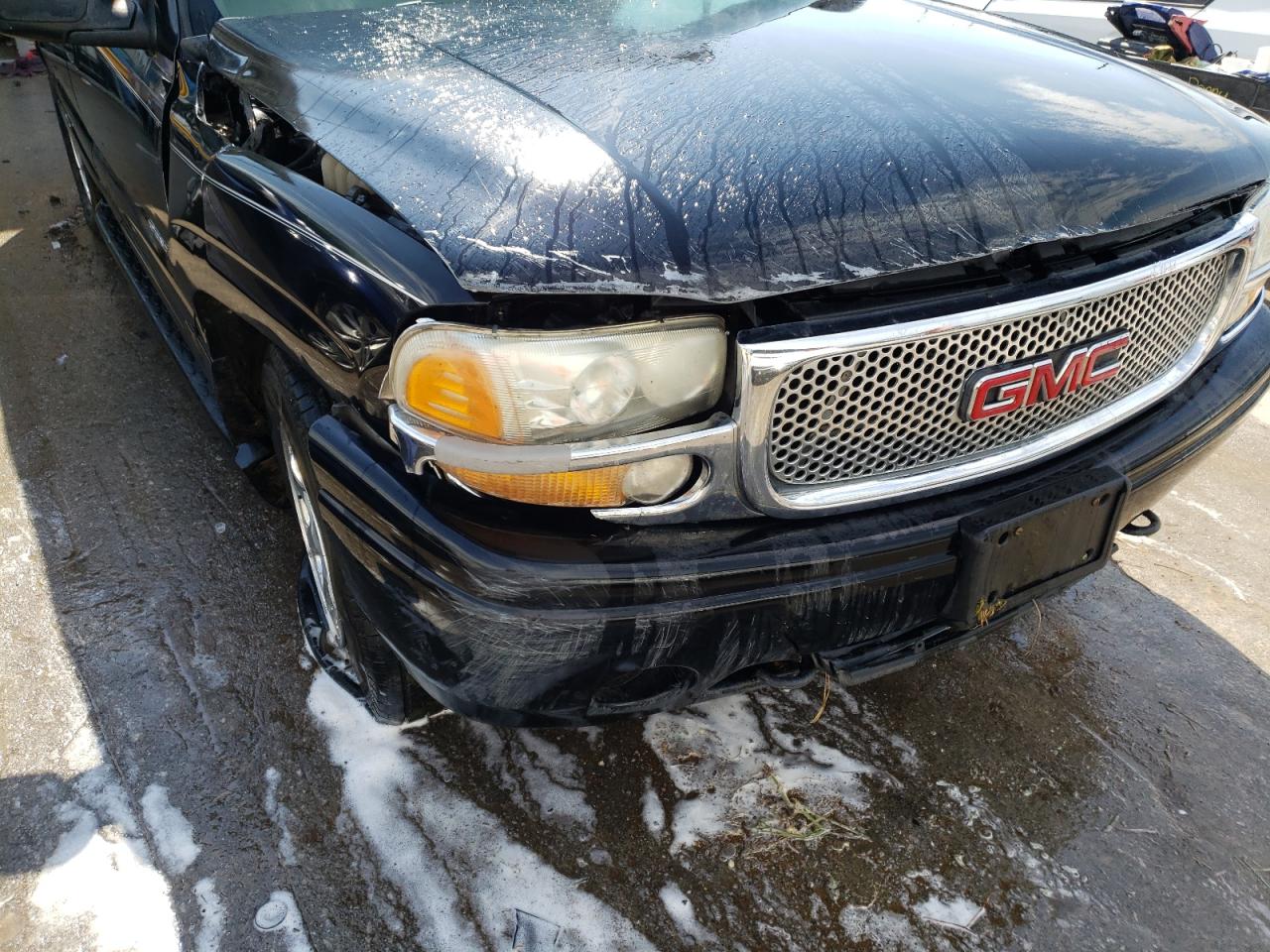 Photo 9 from auction – 2003 GMC YUKON DENA with VIN 1GKEK63U33J249736