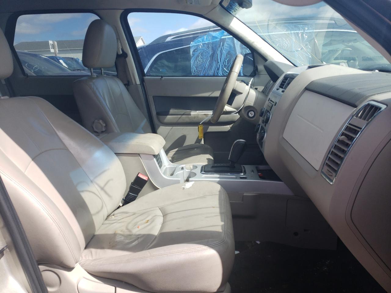 Photo 5 from auction – 2010 MERCURY MARINER with VIN 4M2CN9B75AKJ23953