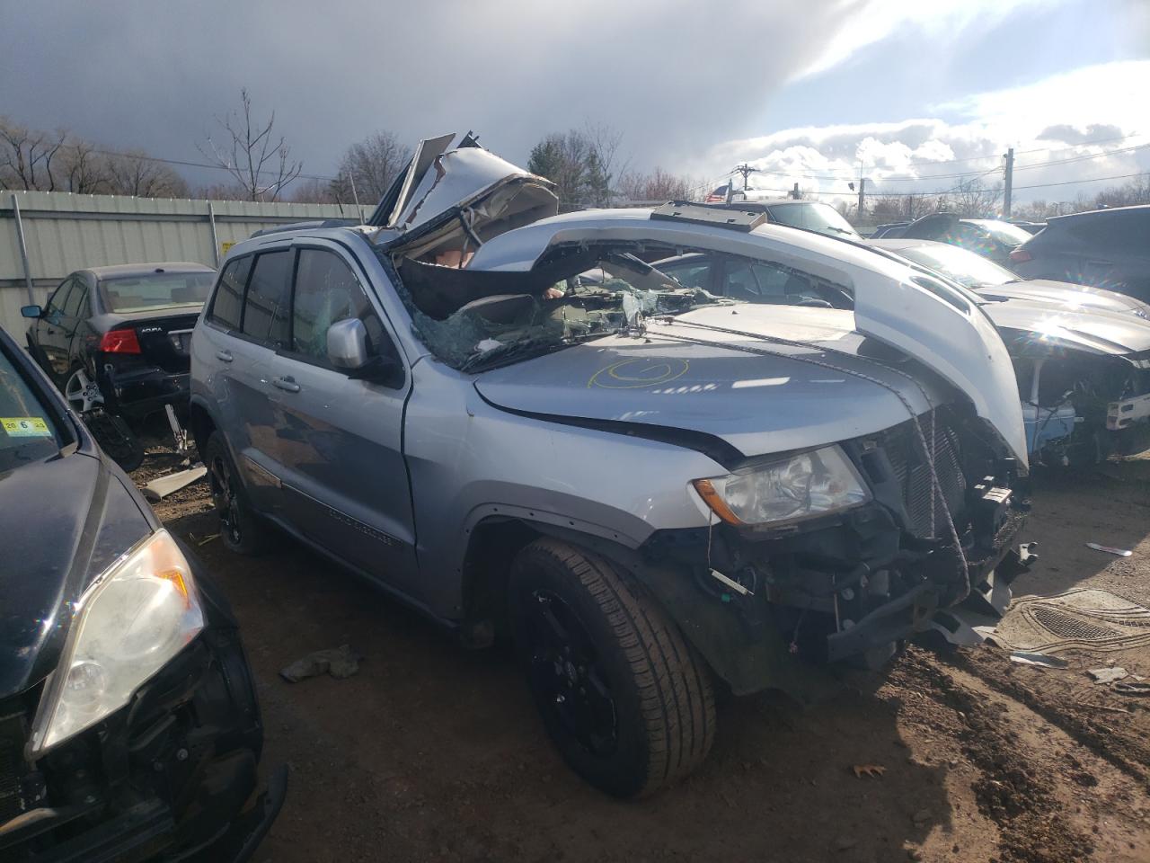 JEEP GRAND CHER 2011 with VIN 1J4RR4GG4BC737561 - Photo from auction