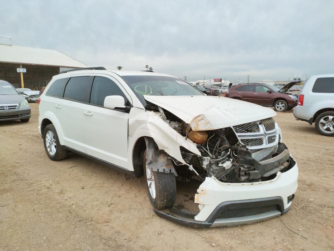 Photo 1 from auction – 2013 DODGE JOURNEY SX with VIN 3C4PDCBG0DT716128