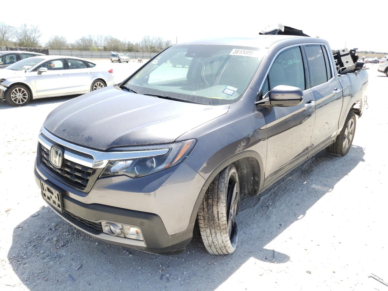 Photo 2 from auction – 2020 HONDA RIDGELINE with VIN 5FPYK3F75LB007249