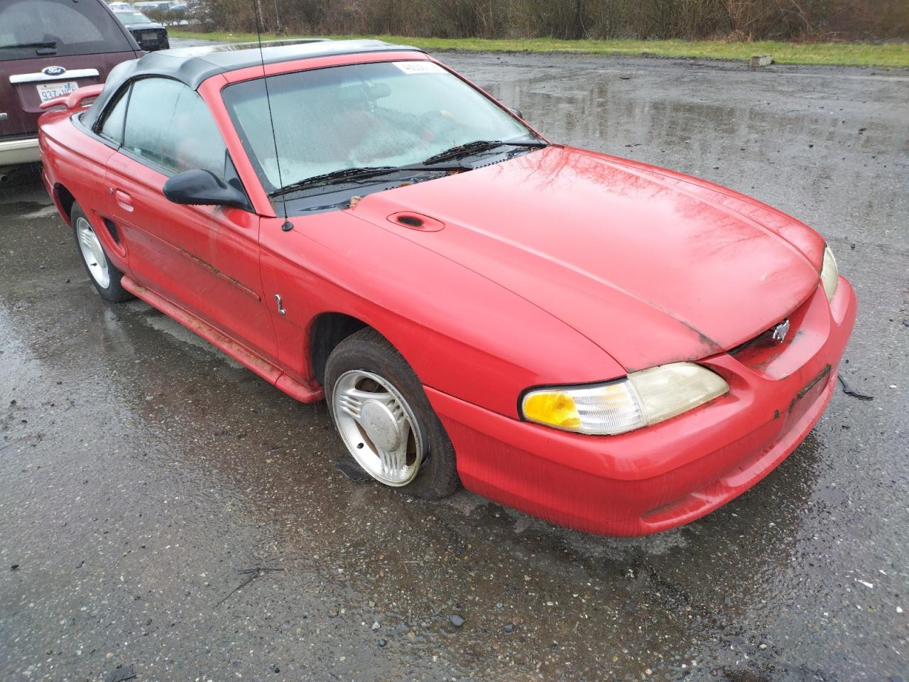 FORD MUSTANG 1994 with VIN 1FALP4441RF180165 - Photo from auction