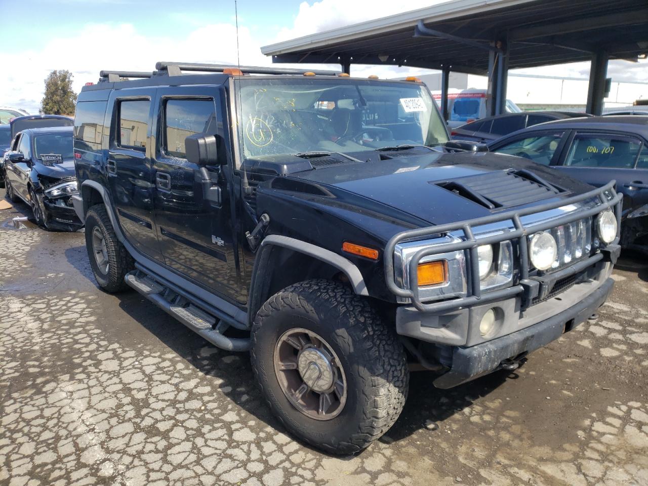 HUMMER H2 2004 with VIN 5GRGN23U54H100658 - Photo from auction