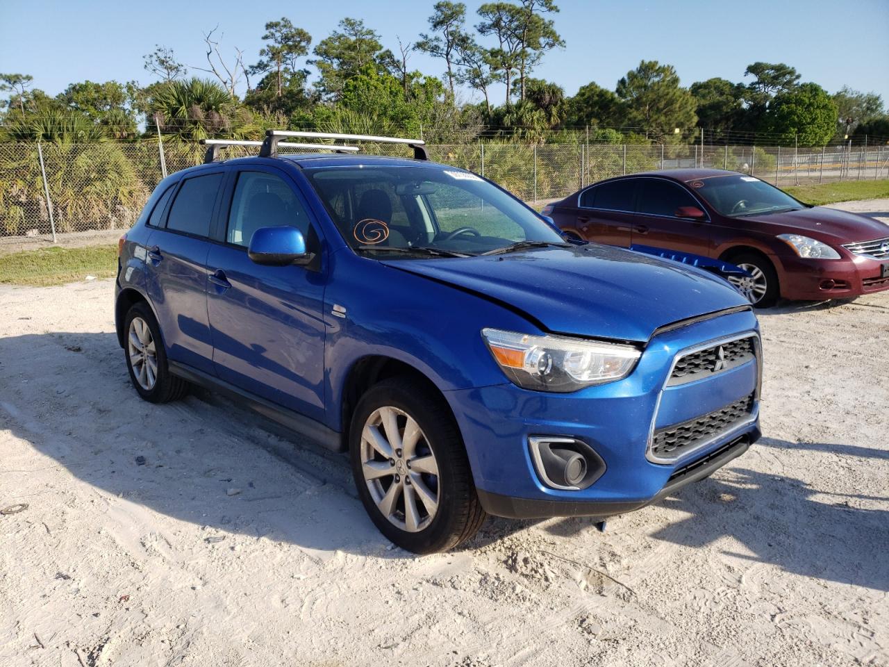 MITSUBISHI OUTLANDER 2015 with VIN 4A4AP3AU3FE020699 - Photo from auction