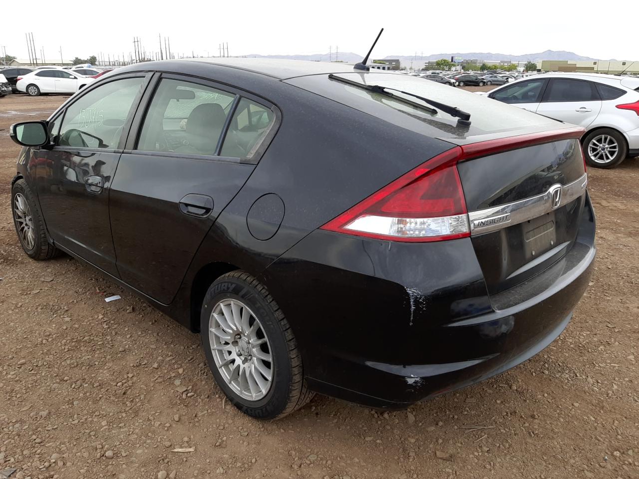 Photo 3 from auction – 2013 HONDA INSIGHT EX with VIN JHMZE2H71DS003858