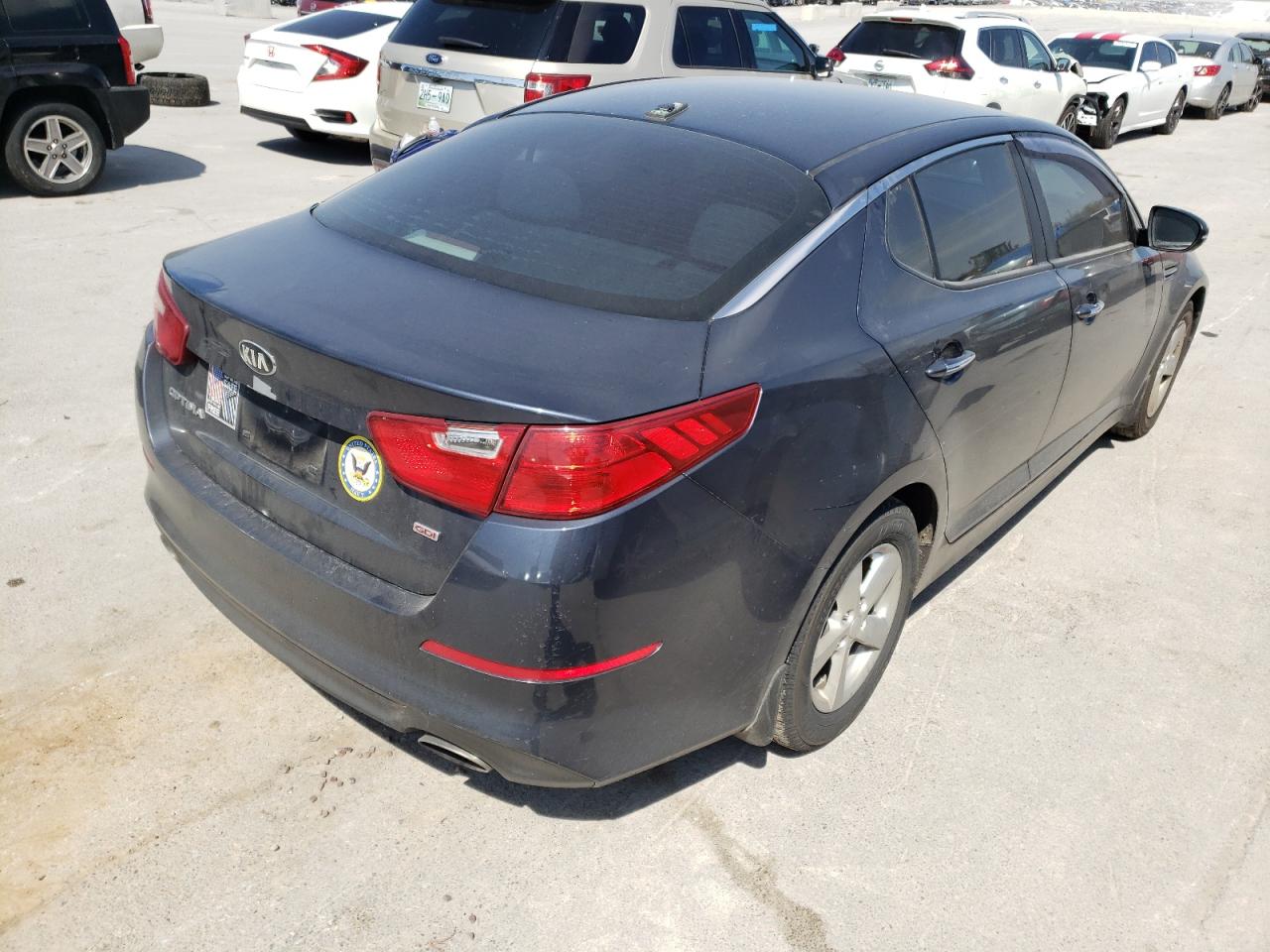 Photo 4 from auction – 2015 KIA OPTIMA LX with VIN KNAGM4A79F5557679