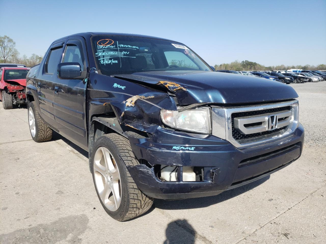 Photo 9 from auction – 2010 HONDA RIDGELINE with VIN 5FPYK1F57AB011366