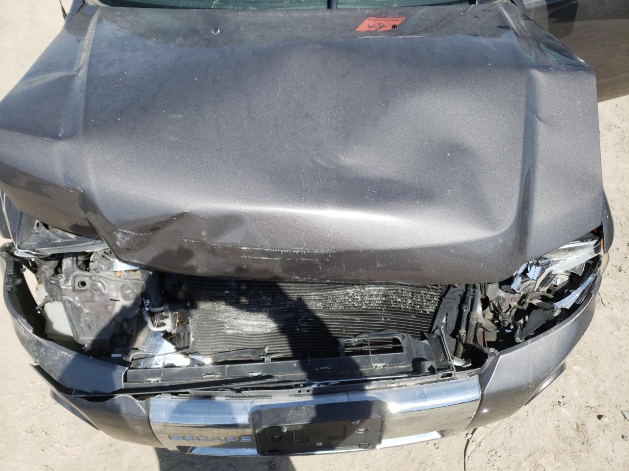 Photo 7 from auction – 2012 FORD ESCAPE LIM with VIN 1FMCU0E74CKC80128