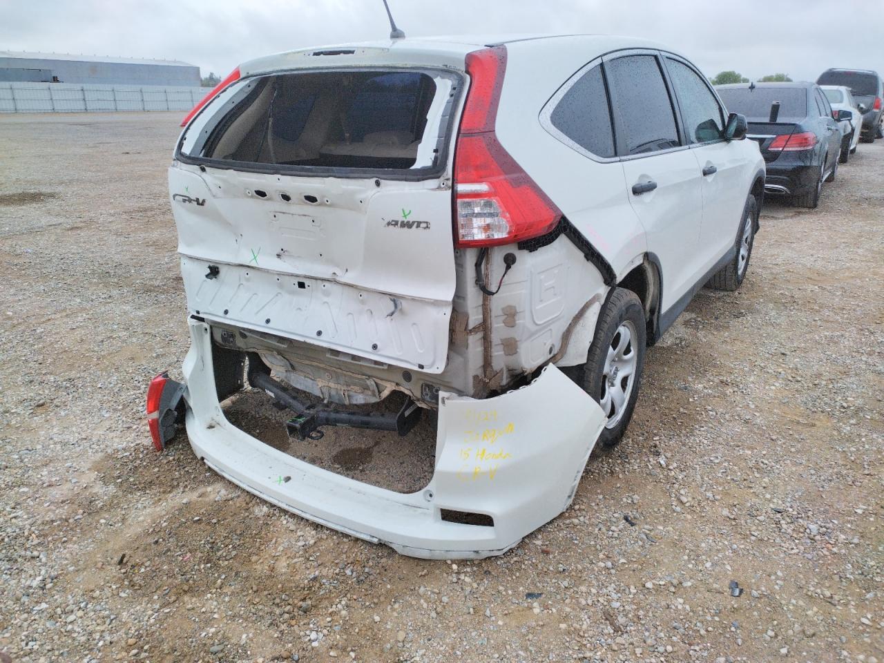 Photo 4 from auction – 2015 HONDA CR-V LX with VIN 5J6RM4H36FL016691