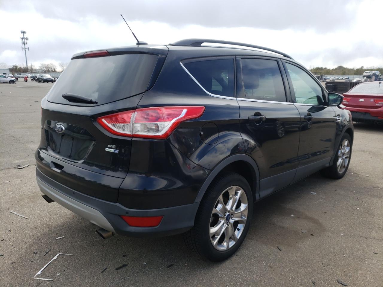 Photo 4 from auction – 2014 FORD ESCAPE SE with VIN 1FMCU9GX9EUB91552
