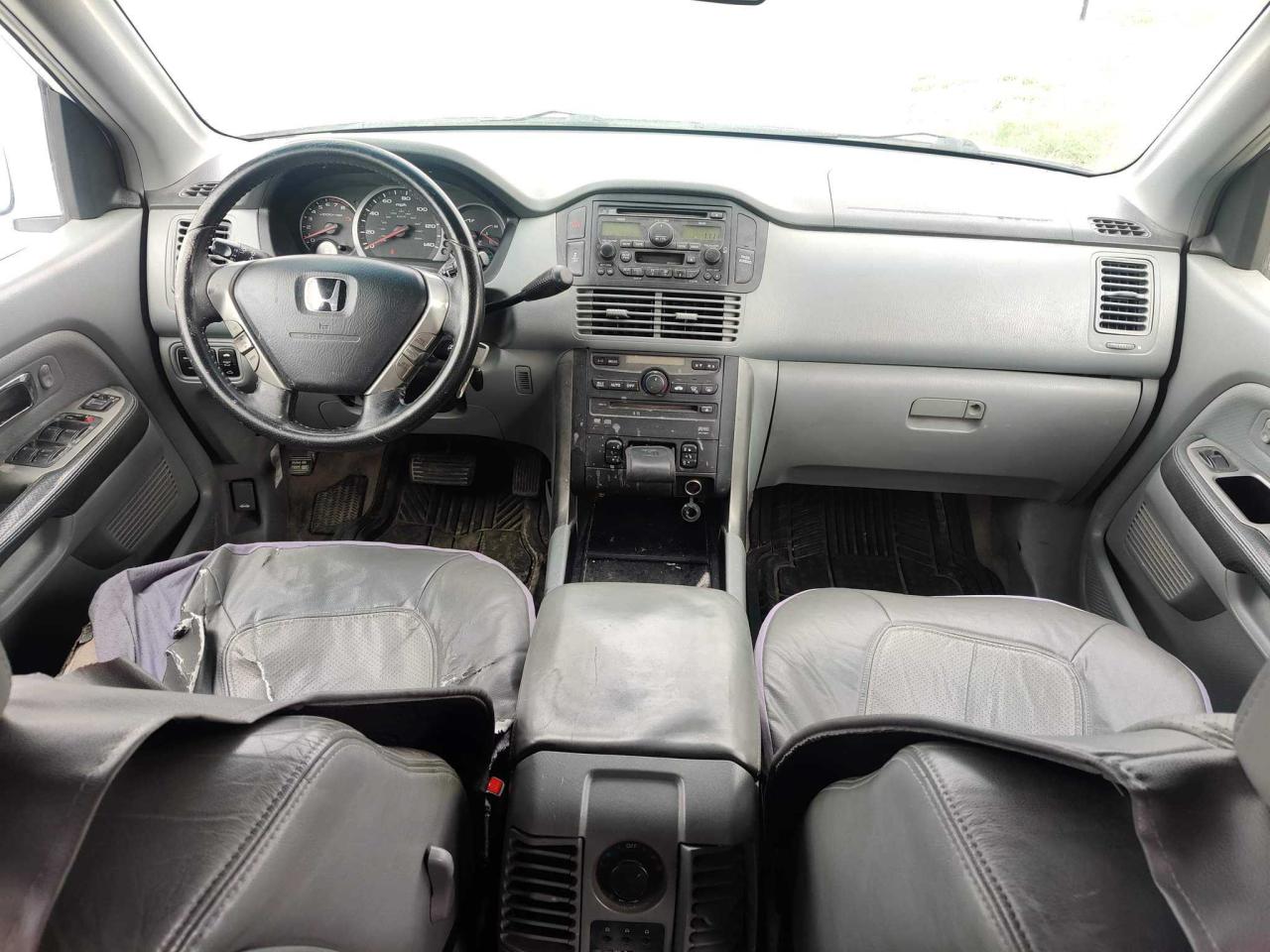 Photo 9 from auction – 2005 HONDA PILOT EXL with VIN 5FNYF186X5B002900