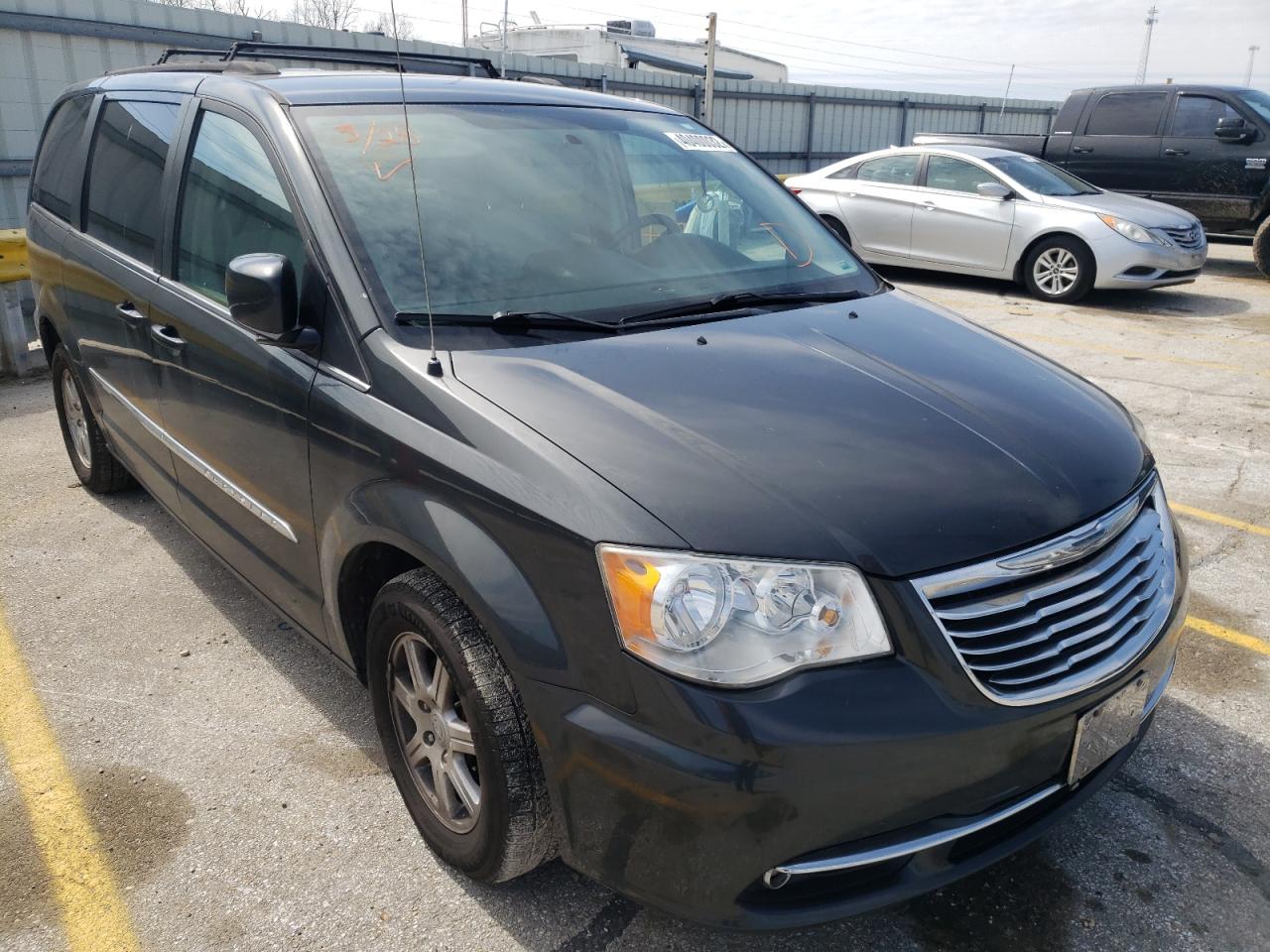 CHRYSLER TOWN & COU 2011 with VIN 2A4RR8DG1BR650414 - Photo from auction