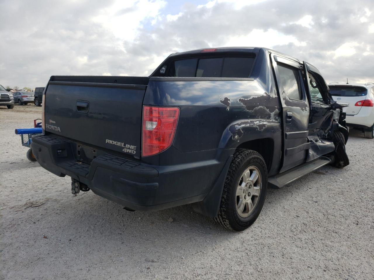 Photo 4 from auction – 2009 HONDA RIDGELINE with VIN 2HJYK16409H501746