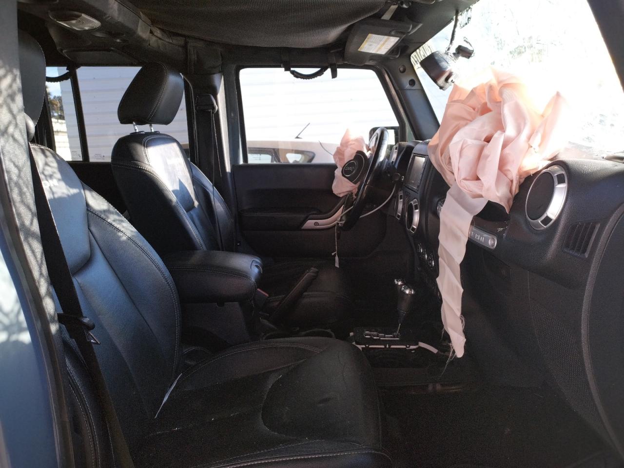 Photo 5 from auction – 2015 JEEP WRANGLER U with VIN 1C4HJWFG7FL648207