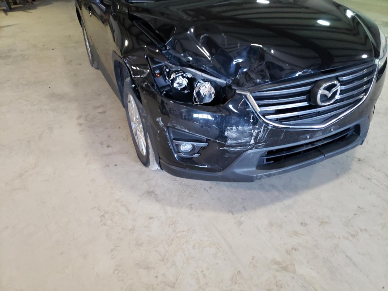 Photo 9 from auction – 2016 MAZDA CX-5 TOURI with VIN JM3KE4CYXG0794512