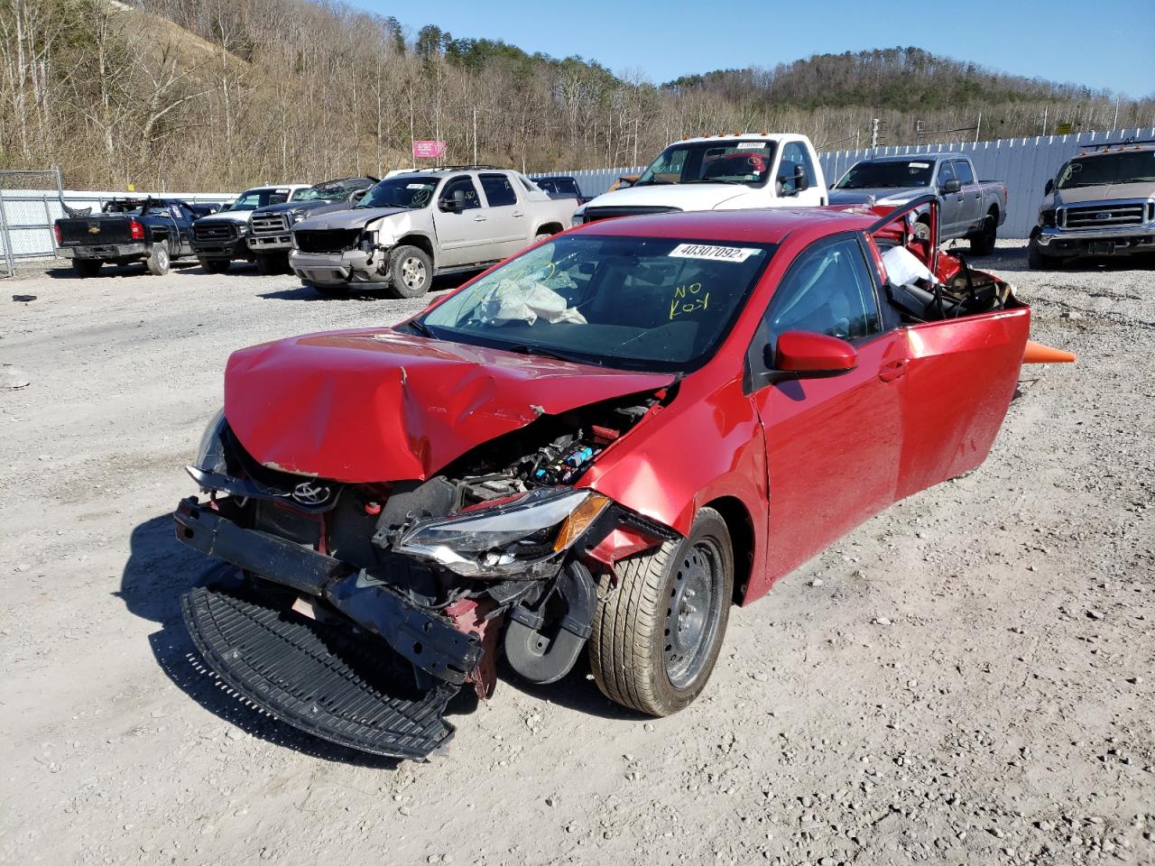 Photo 2 from auction – 2016 TOYOTA COROLLA L with VIN 5YFBURHEXGP440227