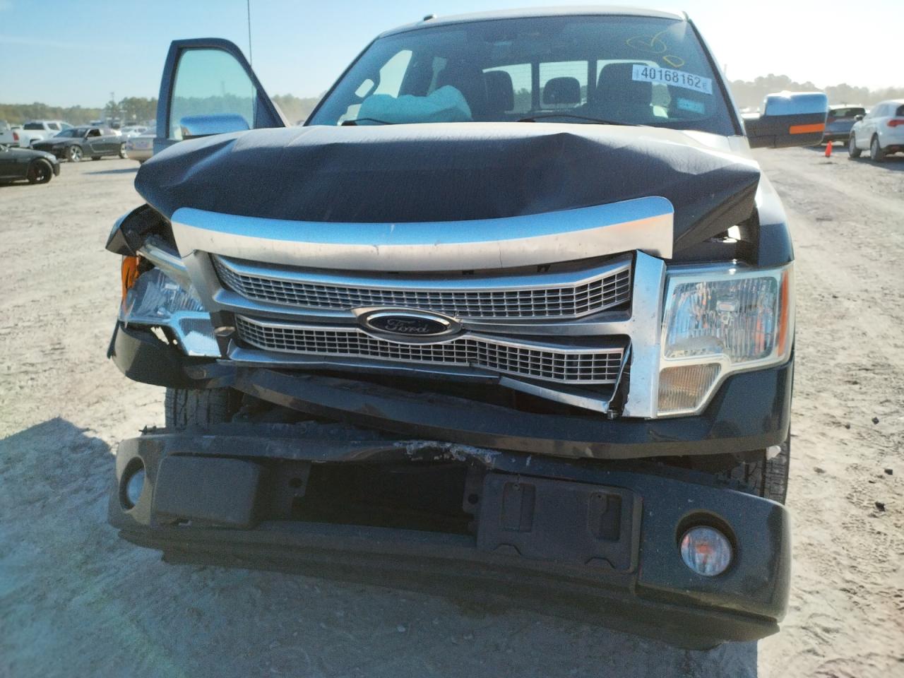 Photo 10 from auction – 2012 FORD F150 SUPER with VIN 1FTFW1CT3CFB56782