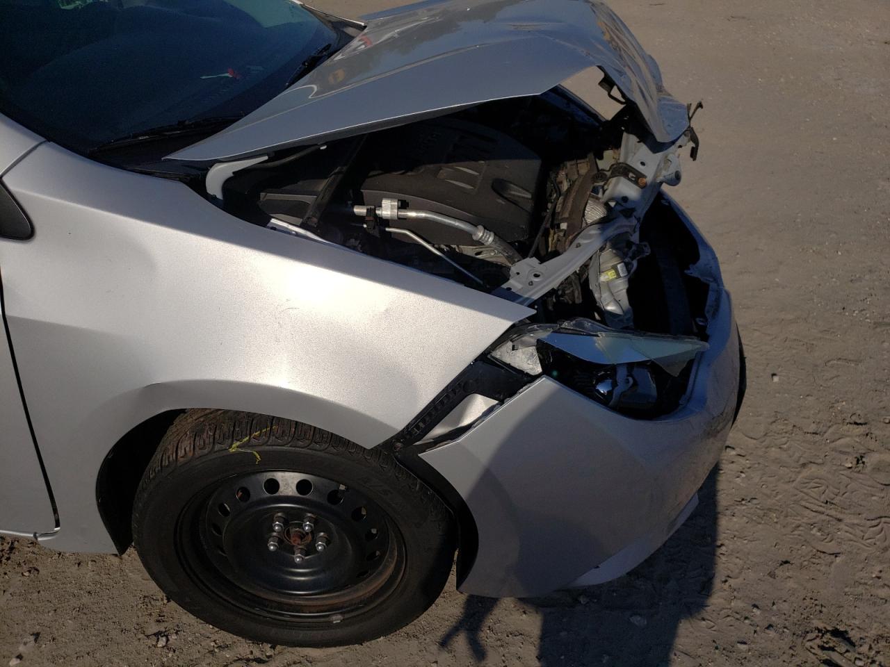 Photo 9 from auction – 2014 TOYOTA COROLLA L with VIN 2T1BURHE6EC019005