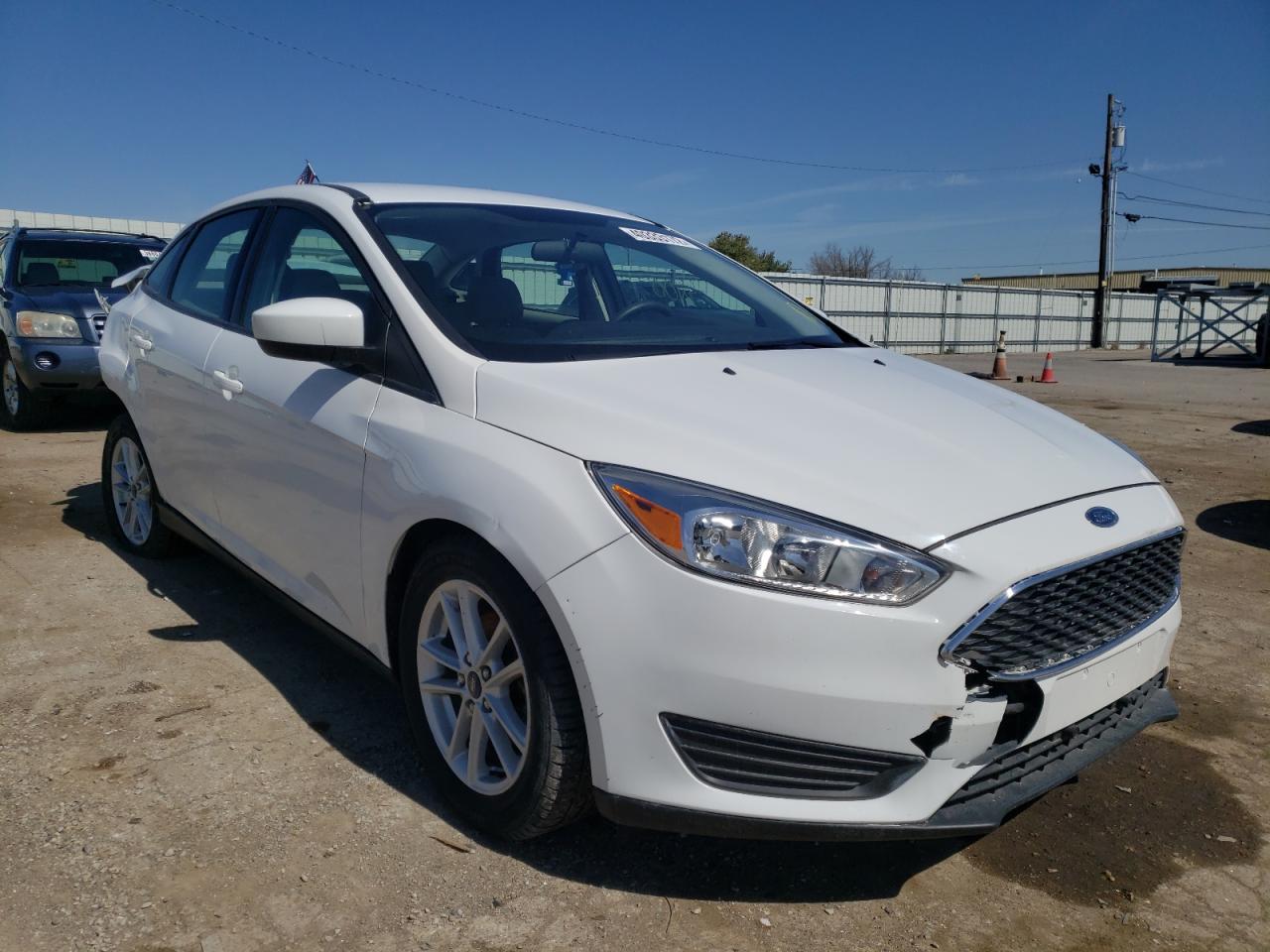 FORD FOCUS SE 2018 con VIN 1FADP3F23JL213036 - Foto de la subasta