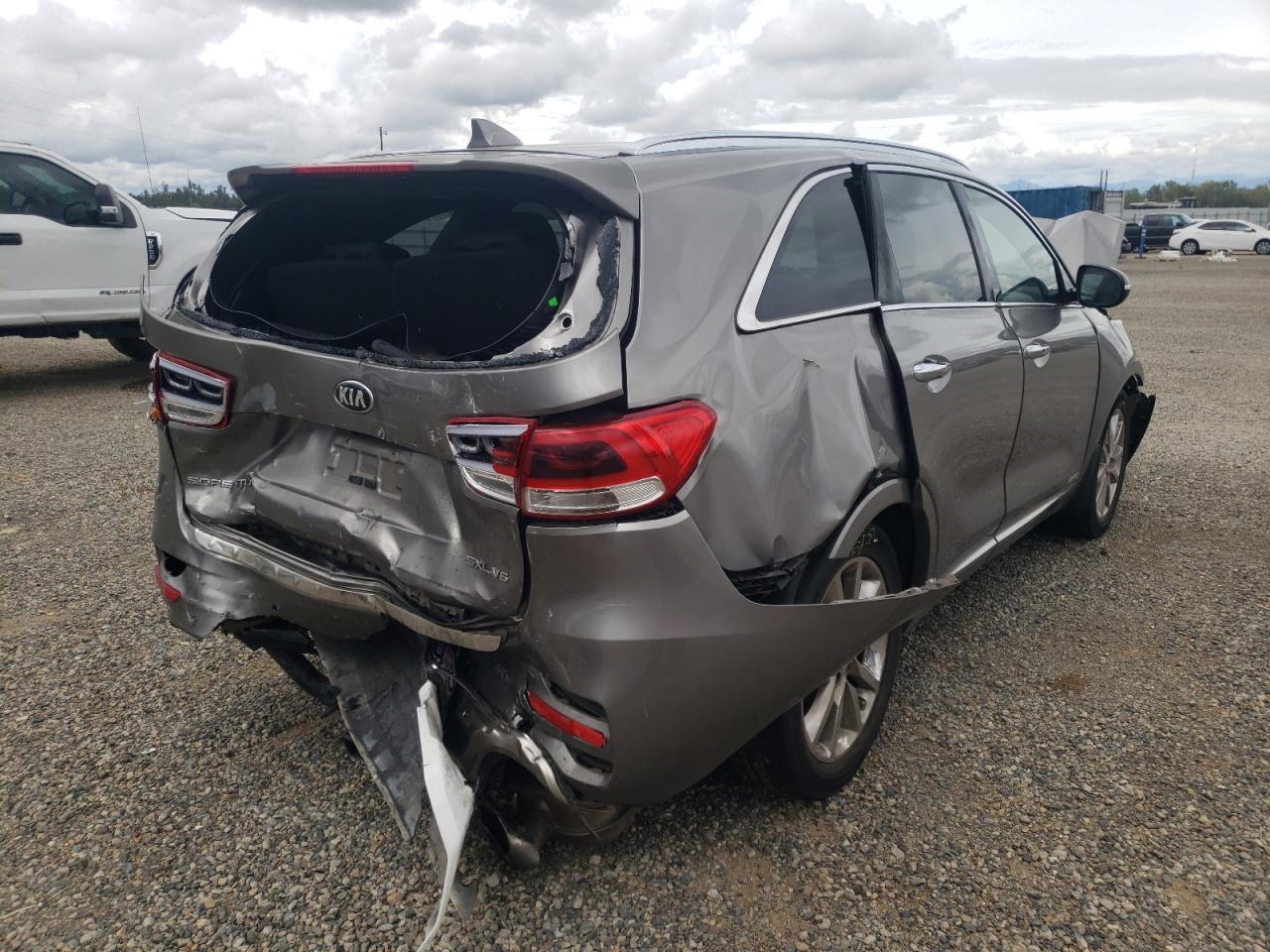 Photo 4 from auction – 2016 KIA SORENTO SX with VIN 5XYPKDA58GG124760