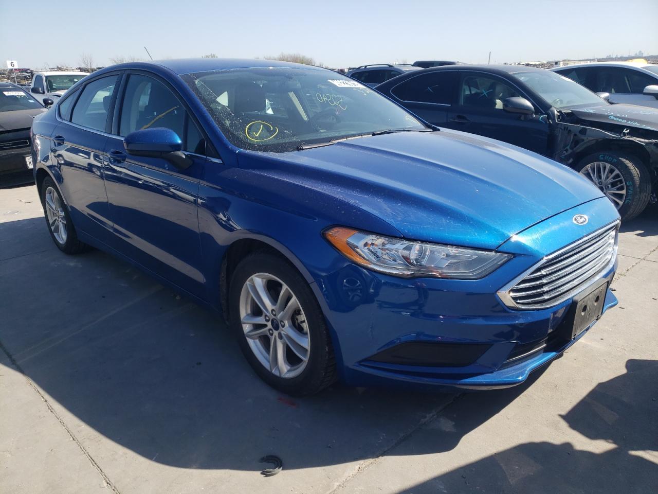 FORD FUSION SE 2018 with VIN 3FA6P0HD0JR115573 - Photo from auction