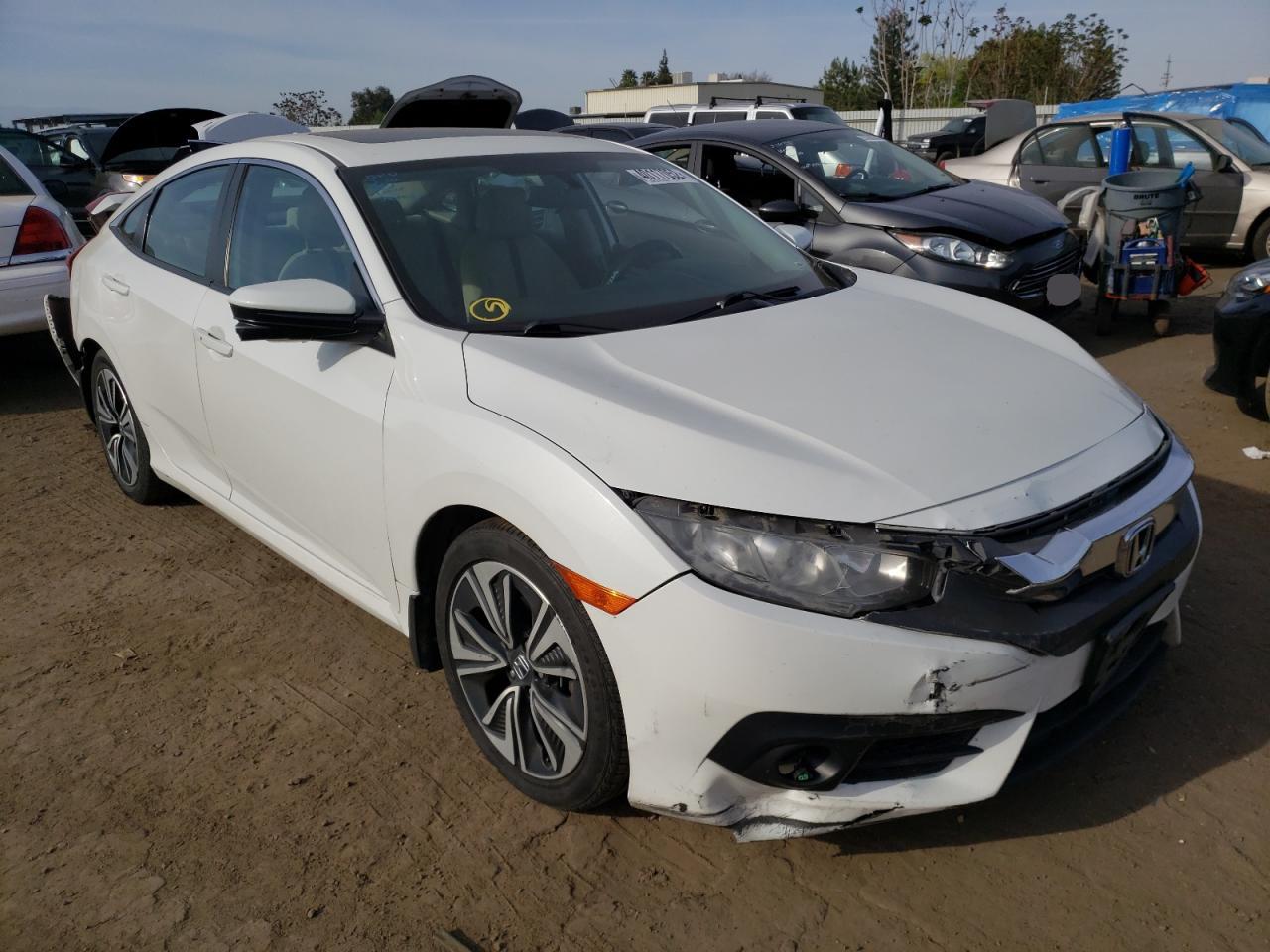 HONDA CIVIC EX 2016 with VIN 2HGFC1F38GH631594 - Photo from auction