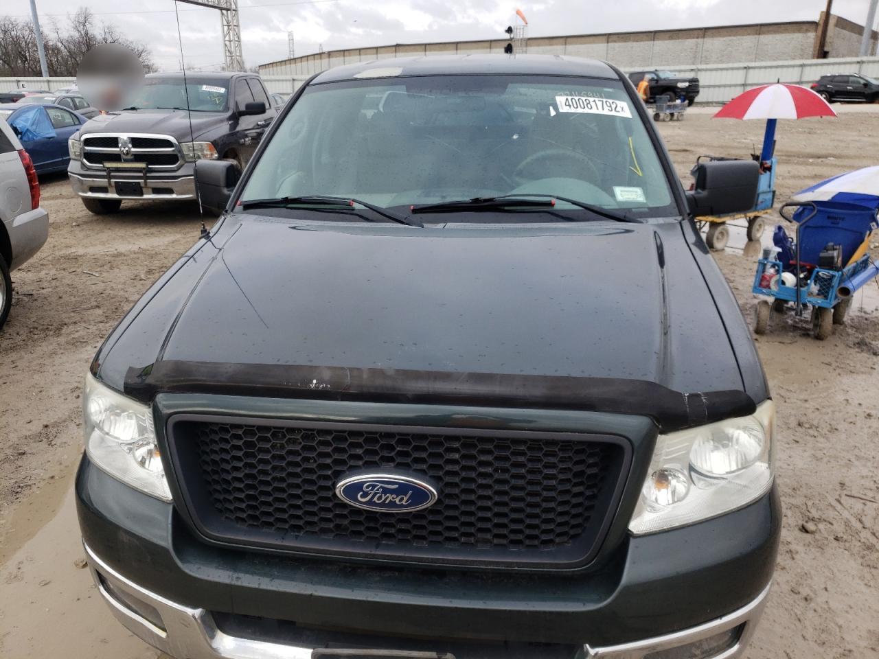 Photo 9 from auction – 2004 FORD F150 with VIN 1FTVF14554NB88202